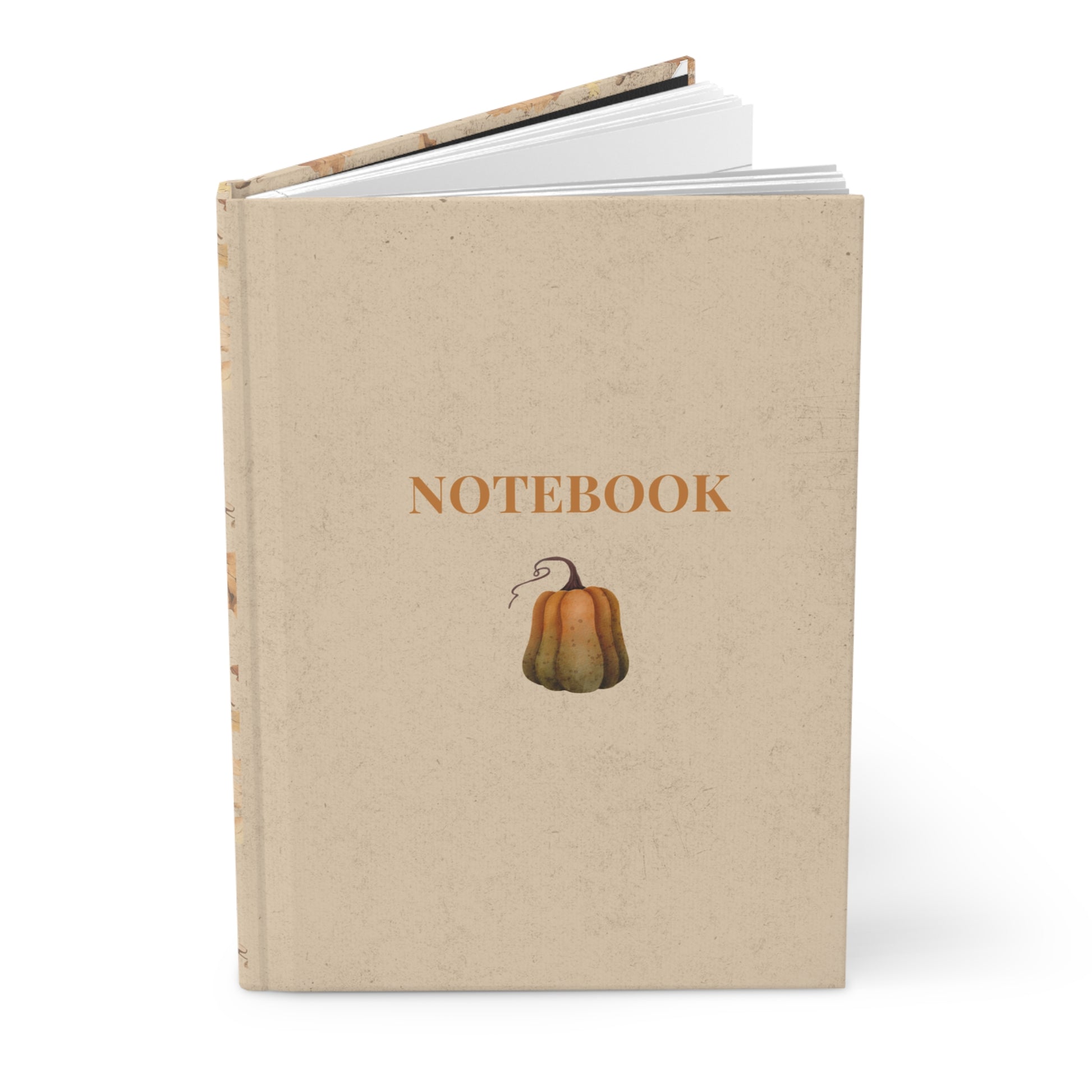 Notebook with pumpkin design and 'Notebook' text on a beige background designed by Studio Hill Designs.