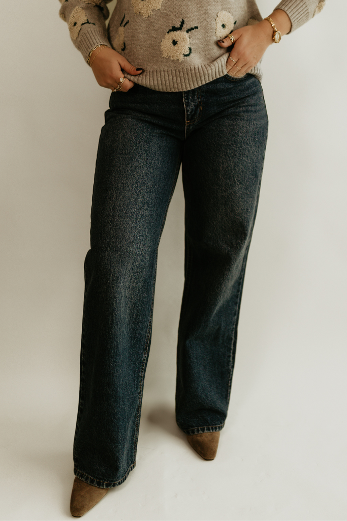 Person wearing the Willow Relaxed Straight Jean in dark denim by Studio Hill Designs.