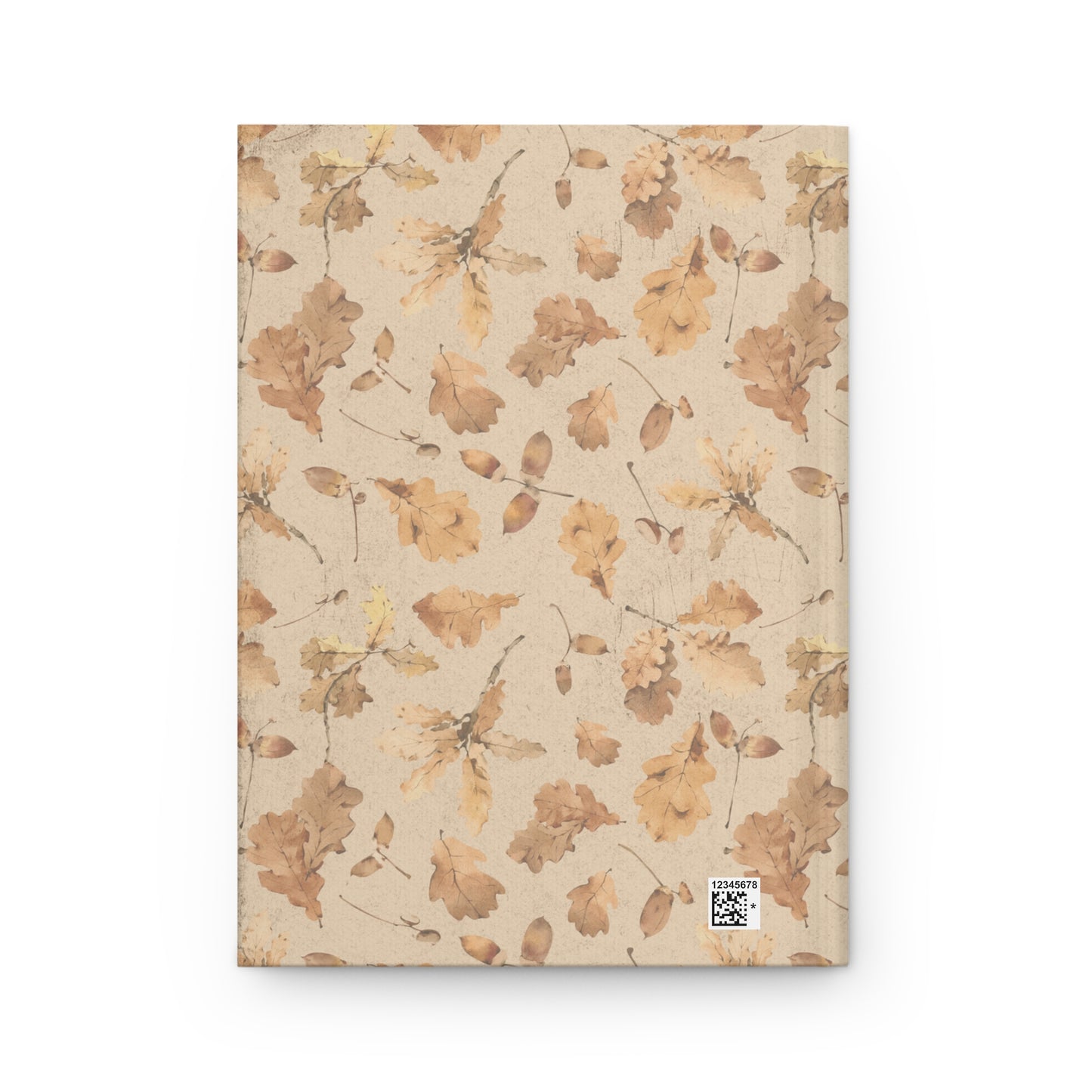 Back side of hardcover autumn notebook with leaf design on a beige background designed by Studio Hill Designs.