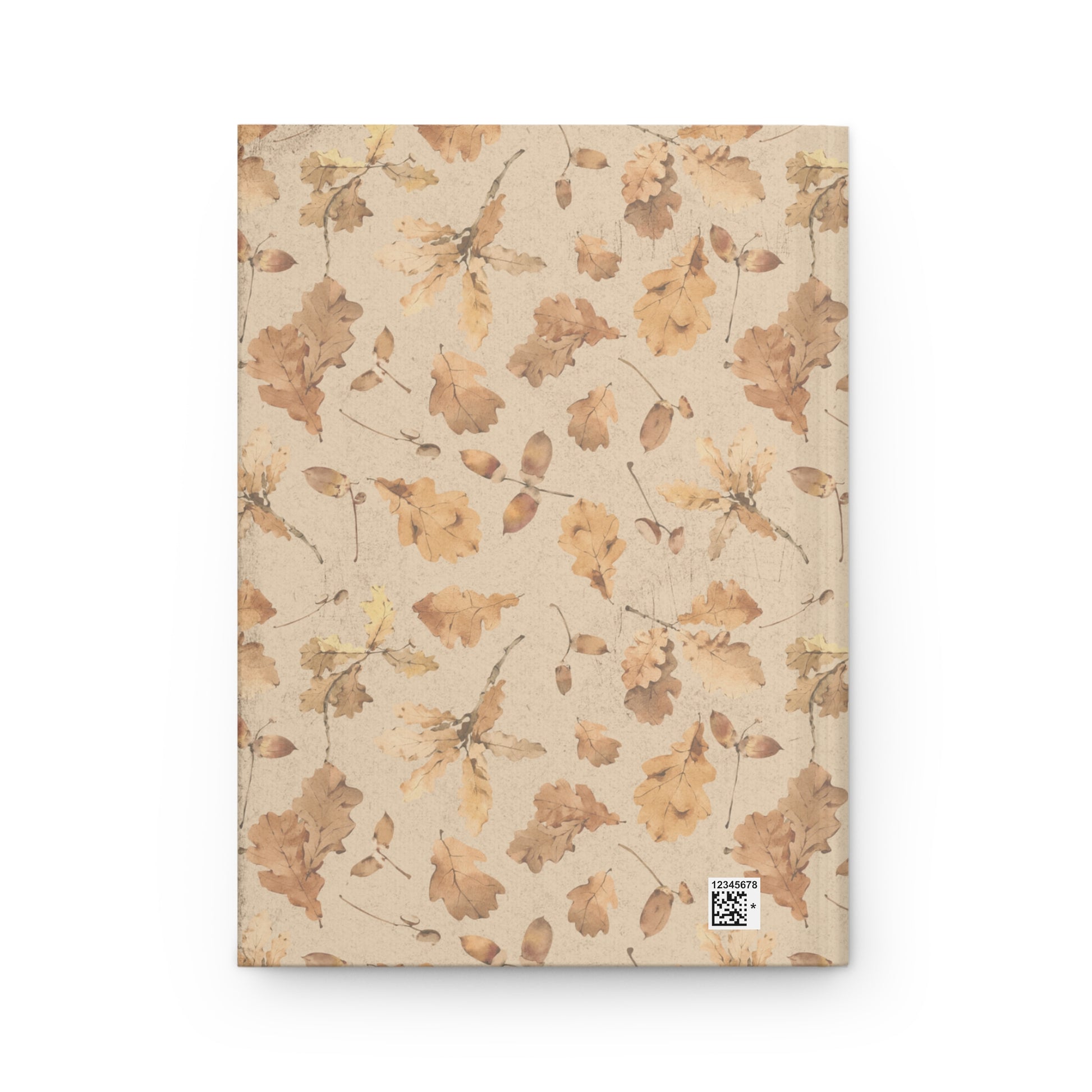 Back side of hardcover autumn notebook with leaf design on a beige background designed by Studio Hill Designs.