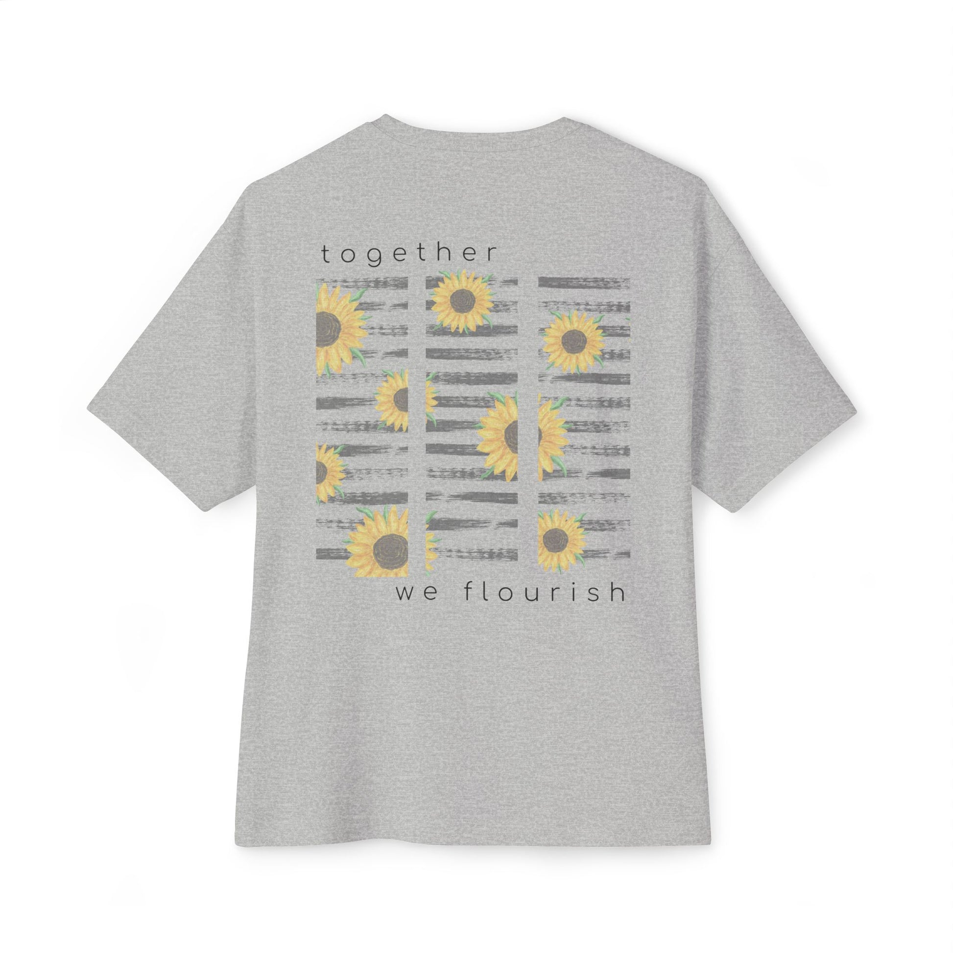 Gray t-shirt with sunflower design with text 'together we flourish' on a white background designed by studio hill designs