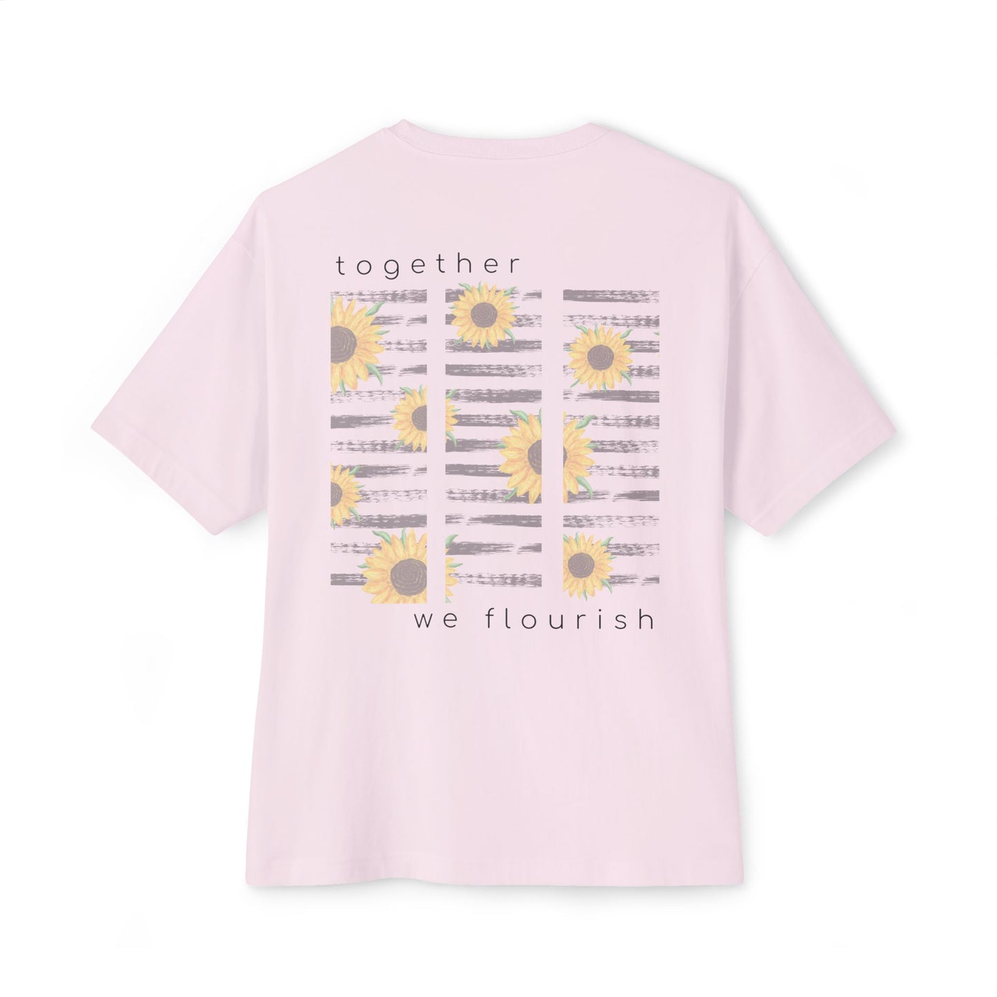 pink t-shirt with sunflower design with text 'together we flourish' on a white background designed by studio hill designs