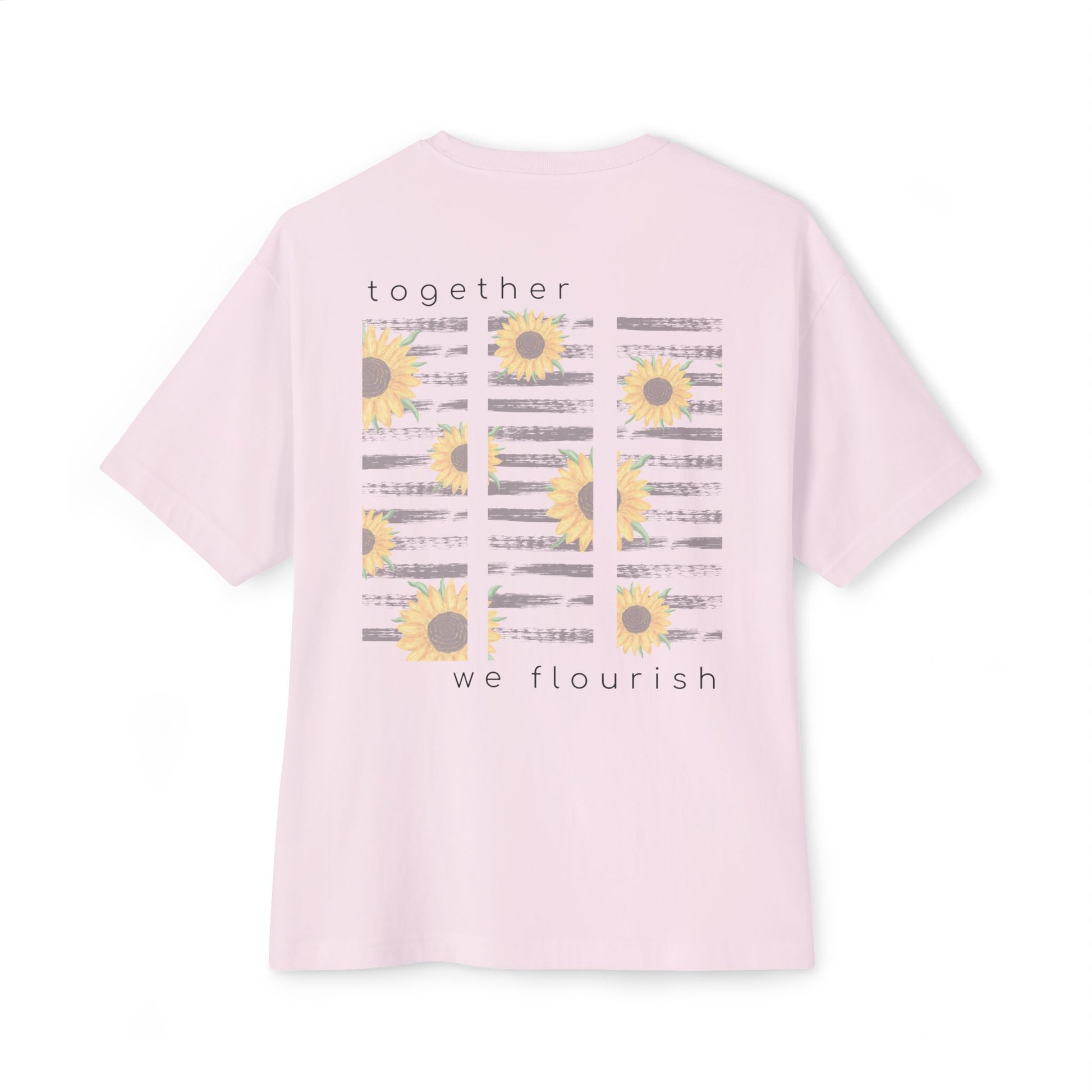 pink t-shirt with sunflower design with text 'together we flourish' on a white background designed by studio hill designs