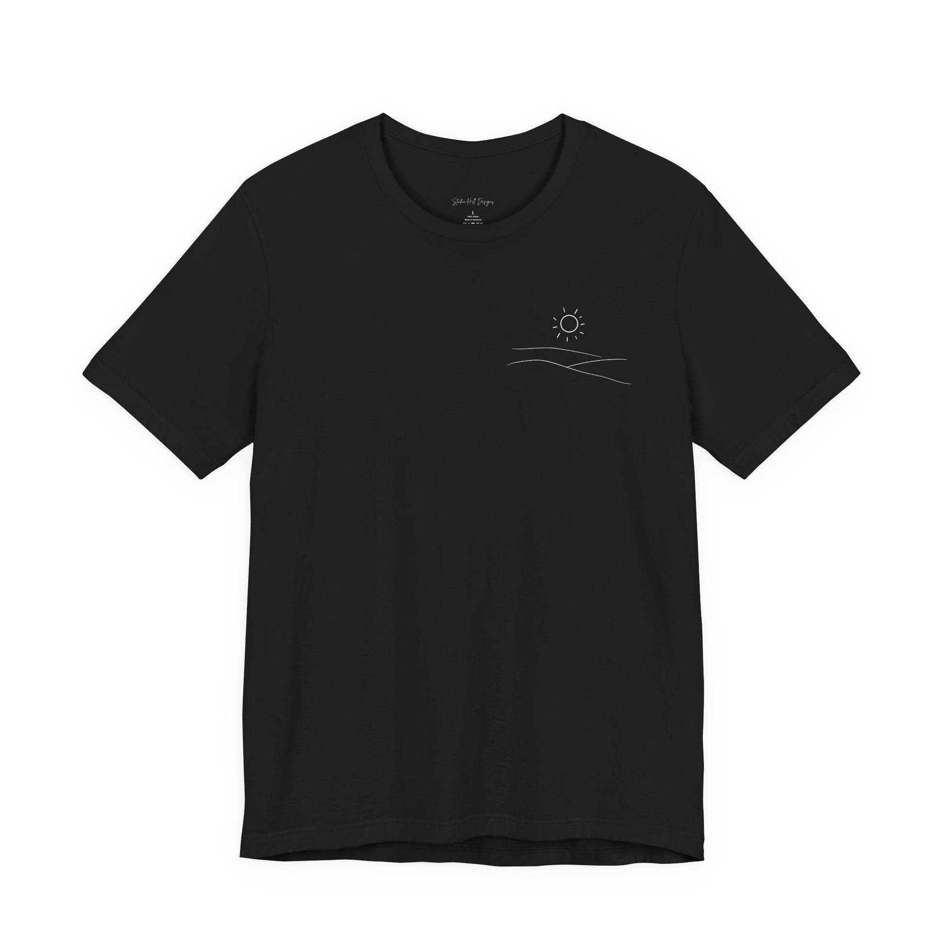 black studio hill designs signature  t-shirt with a small rolling hills and sun logo on a white background