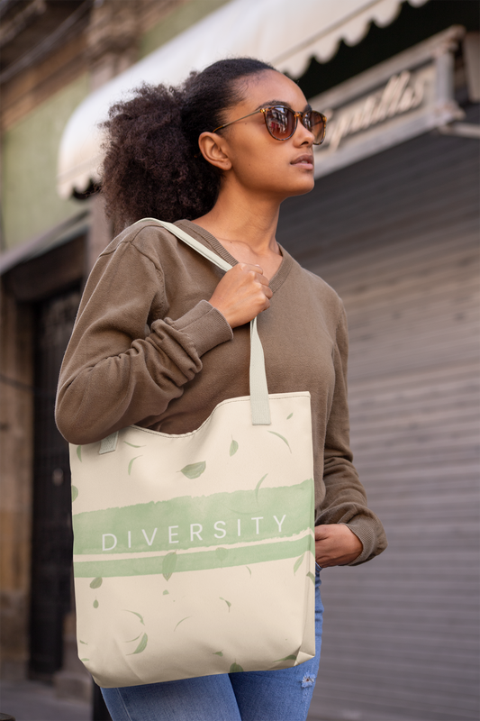Studio Hill Designs canvas tote bag in light cream with green stripe and Diversity text.