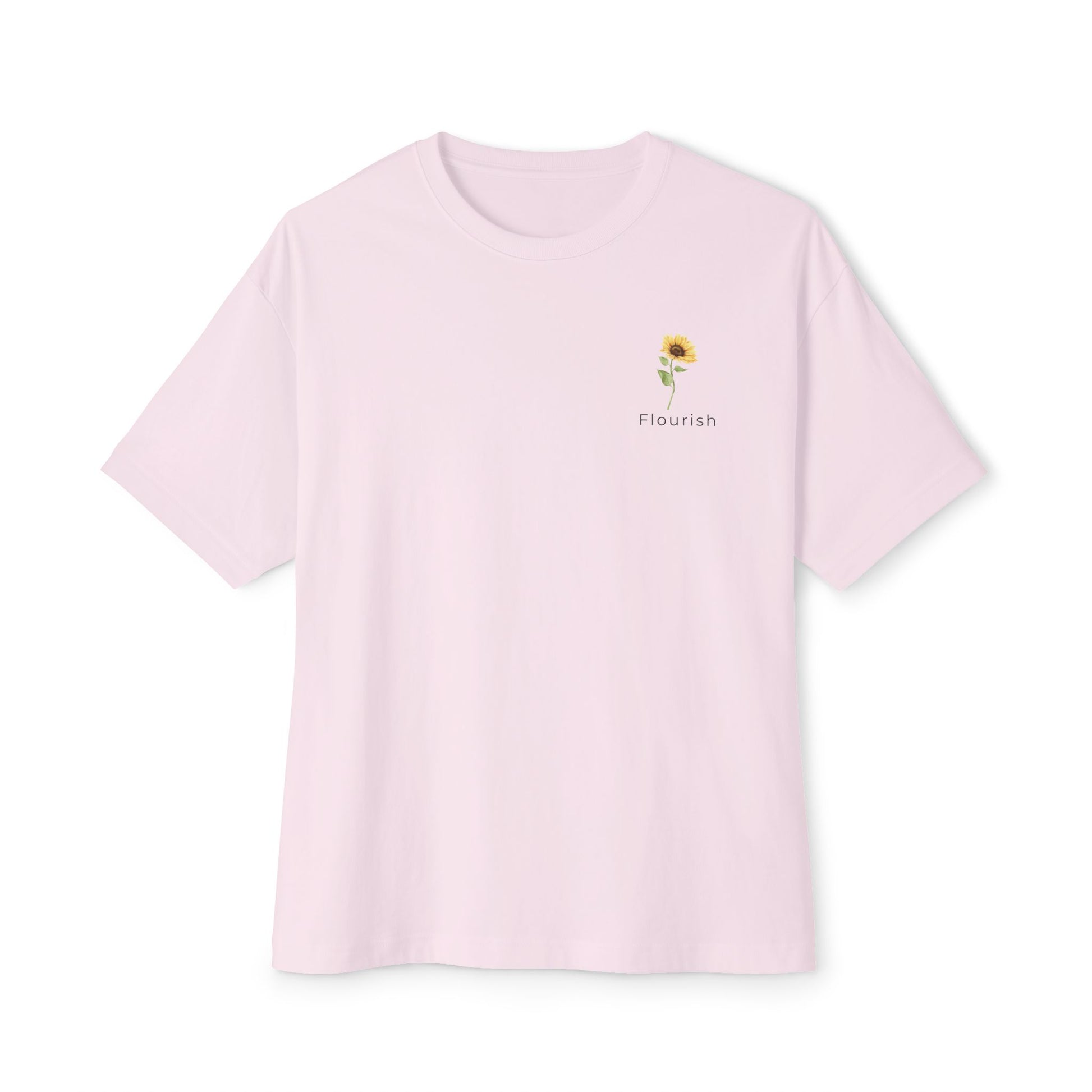 light pink t-shirt with a small sunflower design and 'Flourish' text underneath on a white background designed by studio hill designs