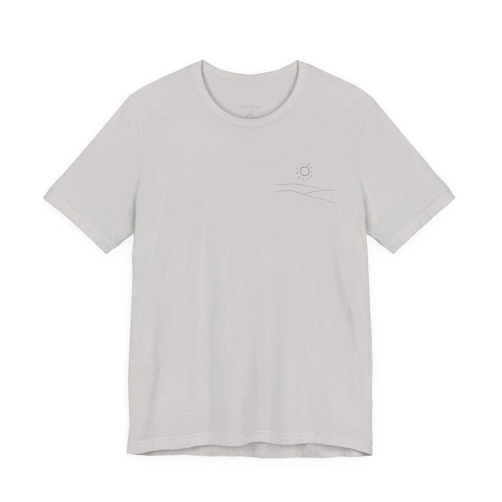 Light gray studio hill designs signature  t-shirt with a small rolling hills and sun logo on a white background